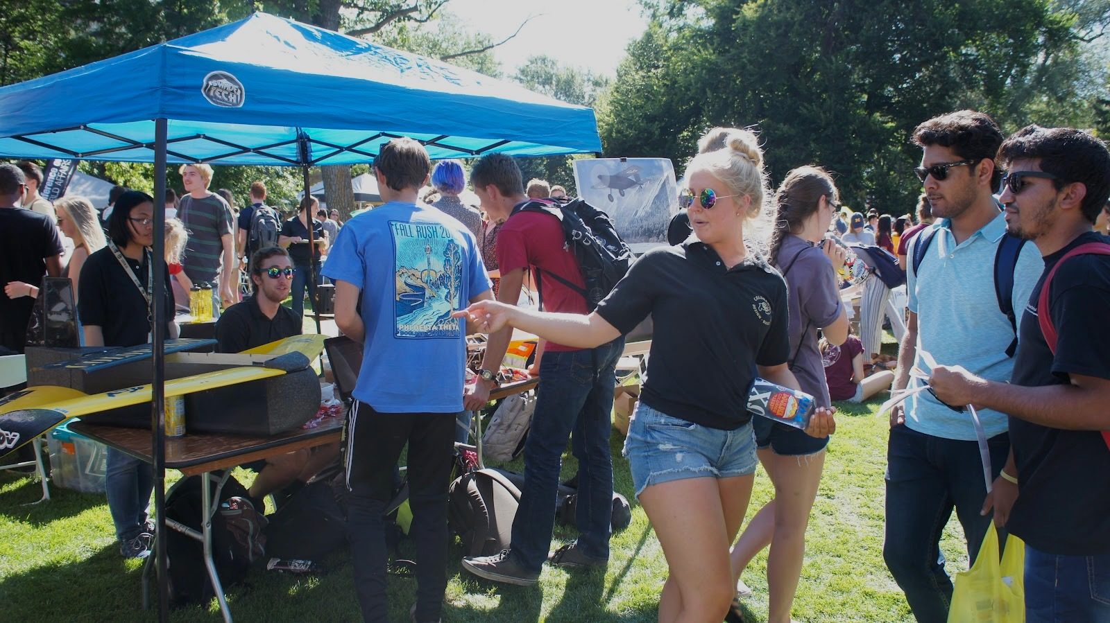 Colorado DBF tabling under a tent at a campus event